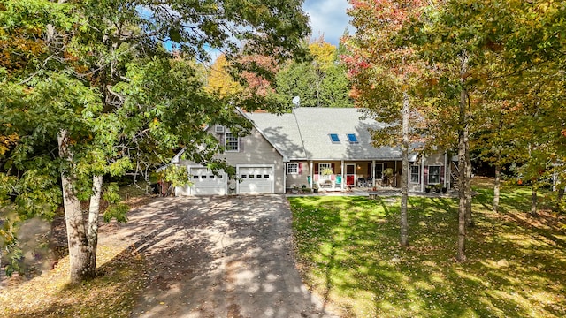 view of front of property with a porch and a front lawn