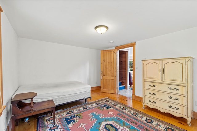 bedroom with light hardwood / wood-style flooring