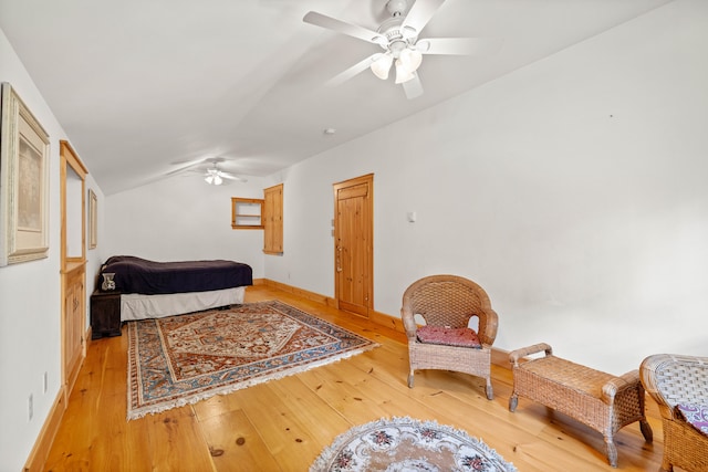 bedroom featuring wood-type flooring and ceiling fan