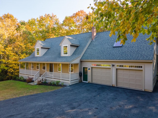 cape cod home featuring a front lawn and a porch