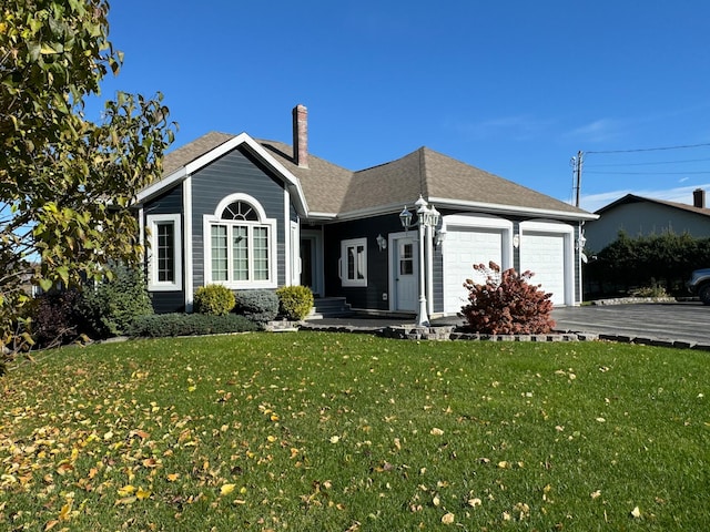 ranch-style house with a front yard and a garage