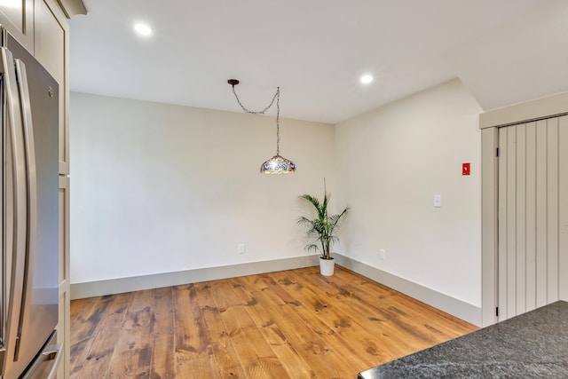 empty room with hardwood / wood-style floors