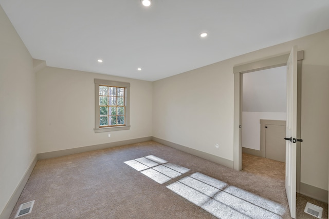 view of carpeted spare room