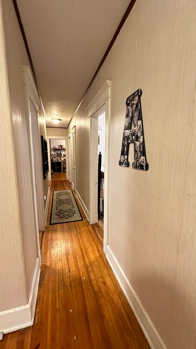 hallway featuring hardwood / wood-style floors