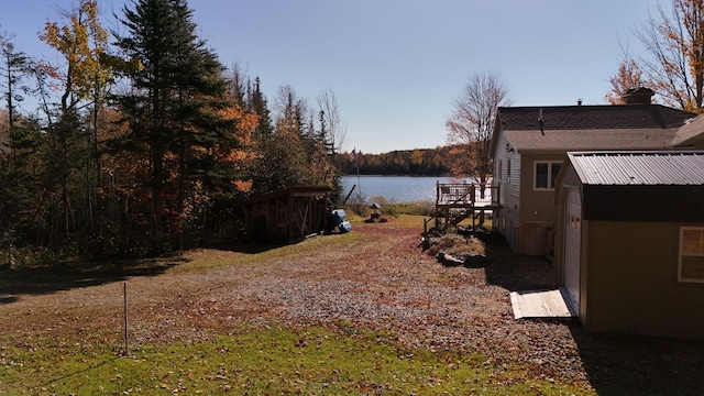 view of yard with a water view