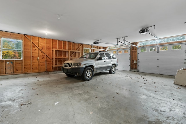 garage featuring a garage door opener