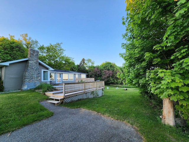 46 S Lubec Rd, Lubec, ME 04652 - view of green lawn featuring a wooden deck