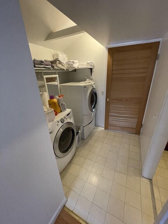 46 S Lubec Rd, Lubec, ME 04652 - laundry room with independent washer and dryer and tile patterned flooring