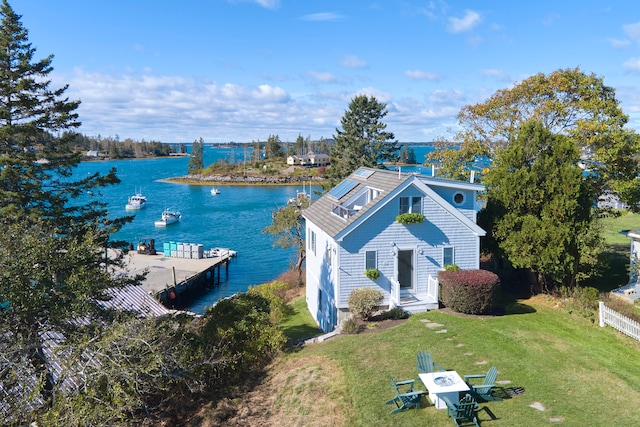 exterior space with a water view