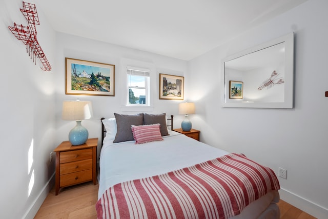 bedroom with light hardwood / wood-style flooring