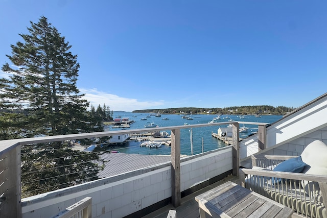 balcony featuring a water view