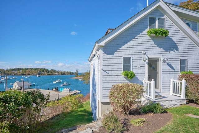 exterior space with a water view