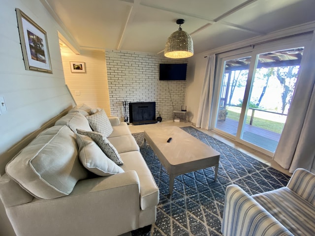 living room featuring a brick fireplace, beam ceiling, and coffered ceiling