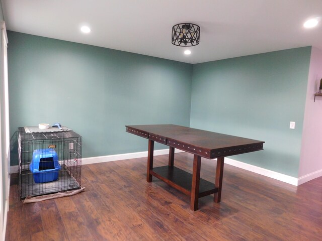 dining room with recessed lighting, wood finished floors, and baseboards