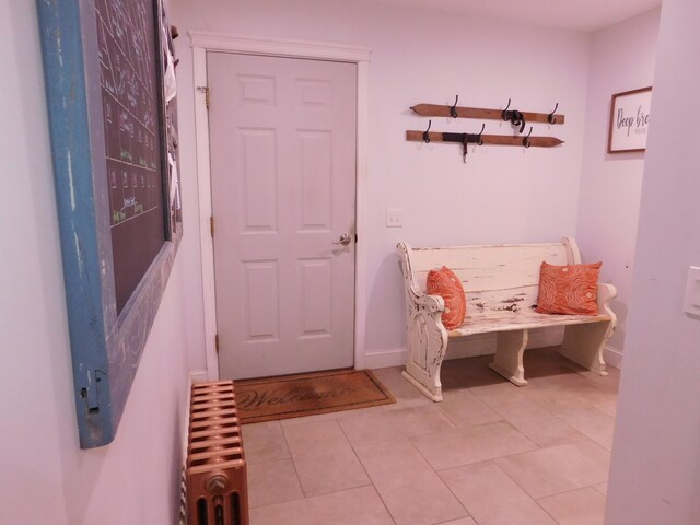 mudroom with tile patterned floors