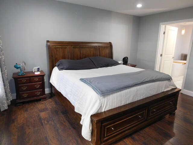 bedroom with dark wood-style floors, recessed lighting, and baseboards