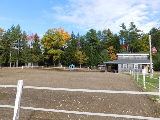 view of home's community with an enclosed area