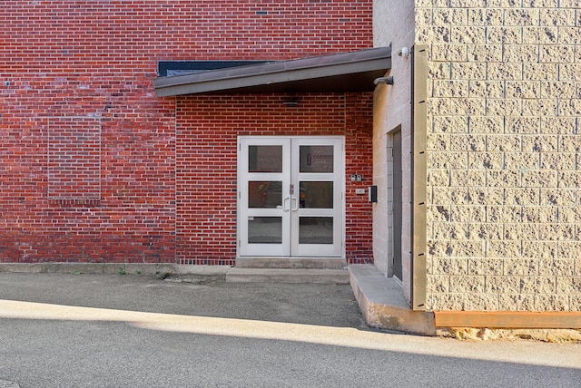 doorway to property featuring french doors