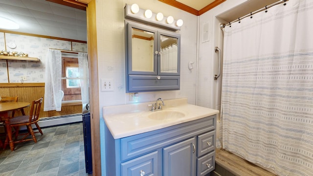 bathroom with vanity, crown molding, and curtained shower