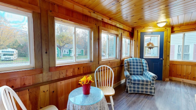 sunroom featuring wood ceiling