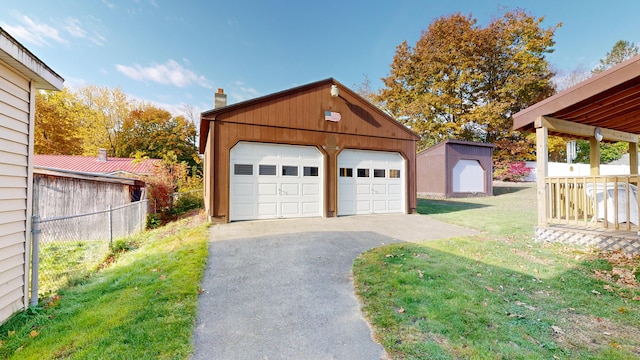 garage with a lawn