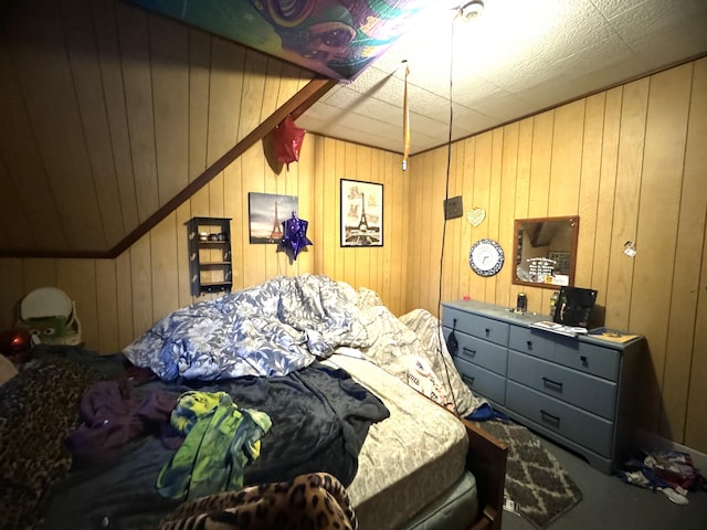 bedroom with wooden walls