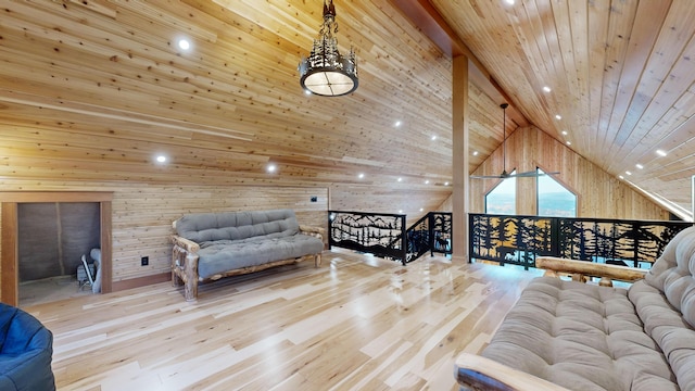 living room featuring wooden ceiling, high vaulted ceiling, beamed ceiling, wooden walls, and hardwood / wood-style flooring