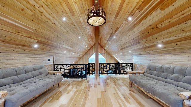 living room featuring light hardwood / wood-style floors, lofted ceiling with beams, wood walls, and wooden ceiling