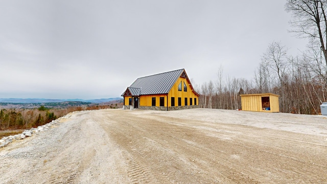 exterior space featuring an outbuilding