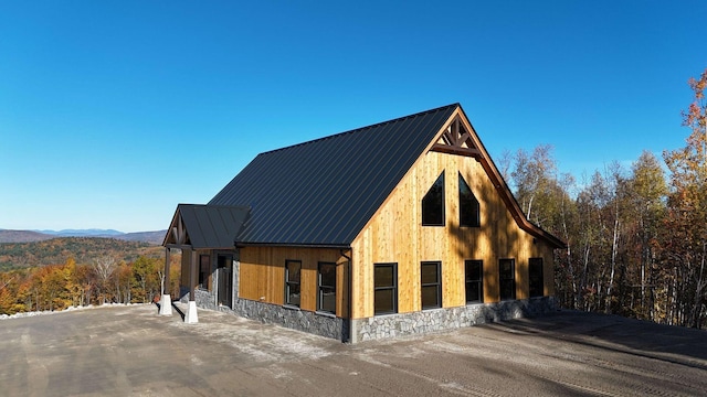 view of side of property featuring a mountain view