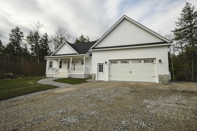 LOT8 Ward Rd, Sebago, ME 04029 - view of front facade with a porch, gravel driveway, and an attached garage