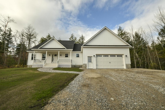 LOT8 Ward Rd, Sebago, ME 04029 - view of front facade with covered porch, gravel driveway, a front yard, and an attached garage