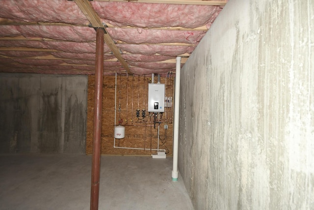 LOT8 Ward Rd, Sebago, ME 04029 - unfinished basement featuring tankless water heater