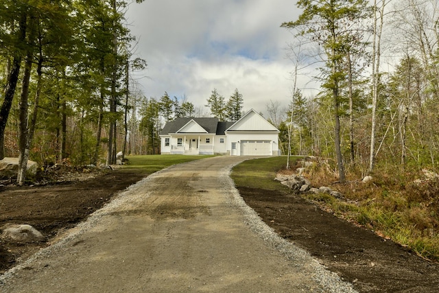 LOT8 Ward Rd, Sebago, ME 04029 - view of front of home with asphalt driveway, an attached garage, and a front lawn