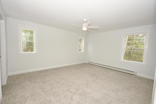LOT8 Ward Rd, Sebago, ME 04029 - empty room featuring baseboard heating, carpet, ceiling fan, and baseboards
