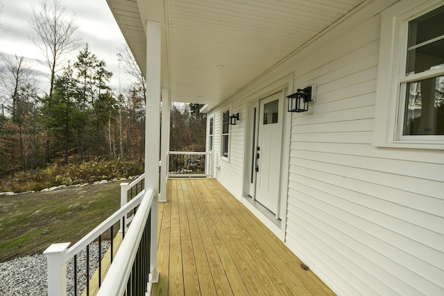 LOT8 Ward Rd, Sebago, ME 04029 - wooden terrace with a porch