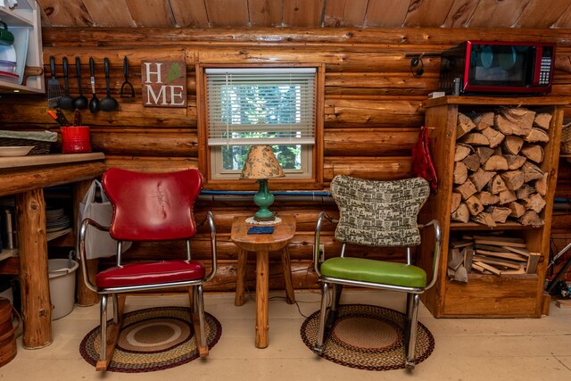 449 Porter Nadeau Rd, Eustis, ME 04936 - living area featuring rustic walls and wood ceiling