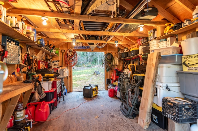 garage featuring wooden walls