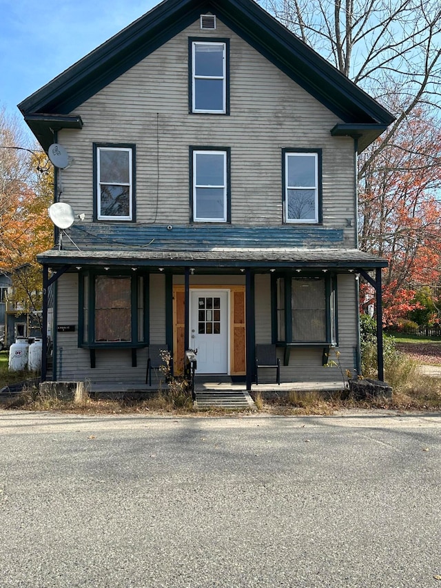 front facade featuring covered porch