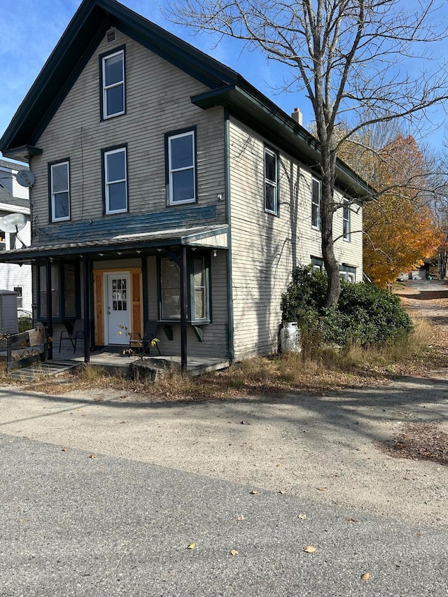 front facade featuring covered porch