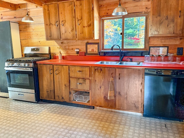 kitchen featuring sink, black dishwasher, decorative light fixtures, and gas range