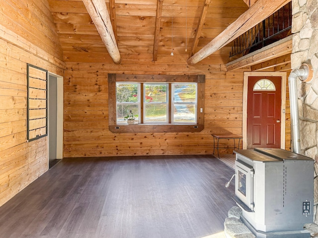 entryway with dark hardwood / wood-style flooring, wood walls, wood ceiling, and vaulted ceiling with beams