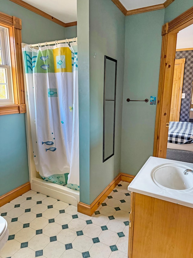 bathroom featuring curtained shower, vanity, toilet, and crown molding