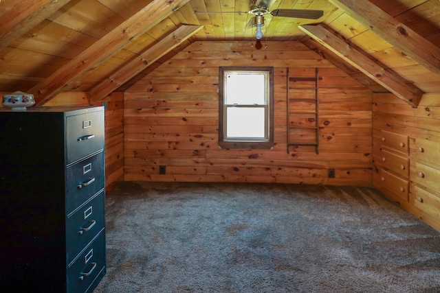 bonus room with wood ceiling, wood walls, lofted ceiling, and dark carpet