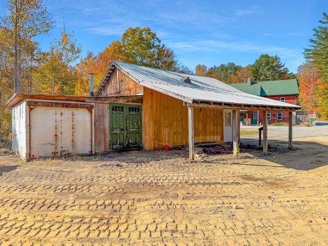 exterior space featuring an outbuilding