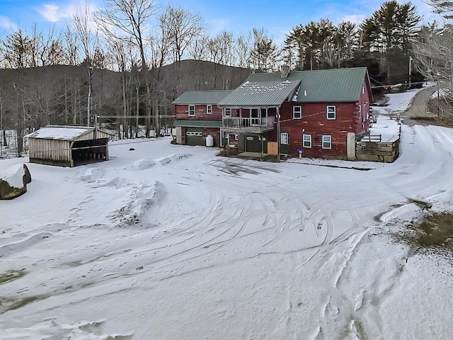 view of snow covered property