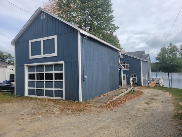 900 Brewer Lake Rd, Orrington, ME 04474 - detached garage featuring dirt driveway