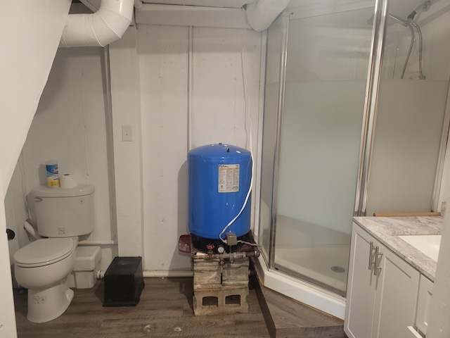 900 Brewer Lake Rd, Orrington, ME 04474 - bathroom featuring wood finished floors, a stall shower, and vanity