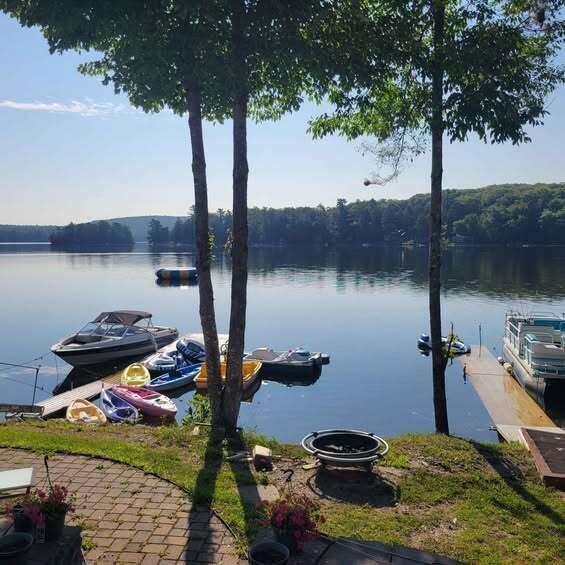 900 Brewer Lake Rd, Orrington, ME 04474 - dock area featuring a water view and a wooded view