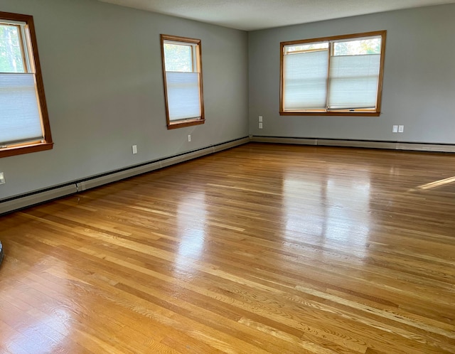 spare room with light wood-type flooring